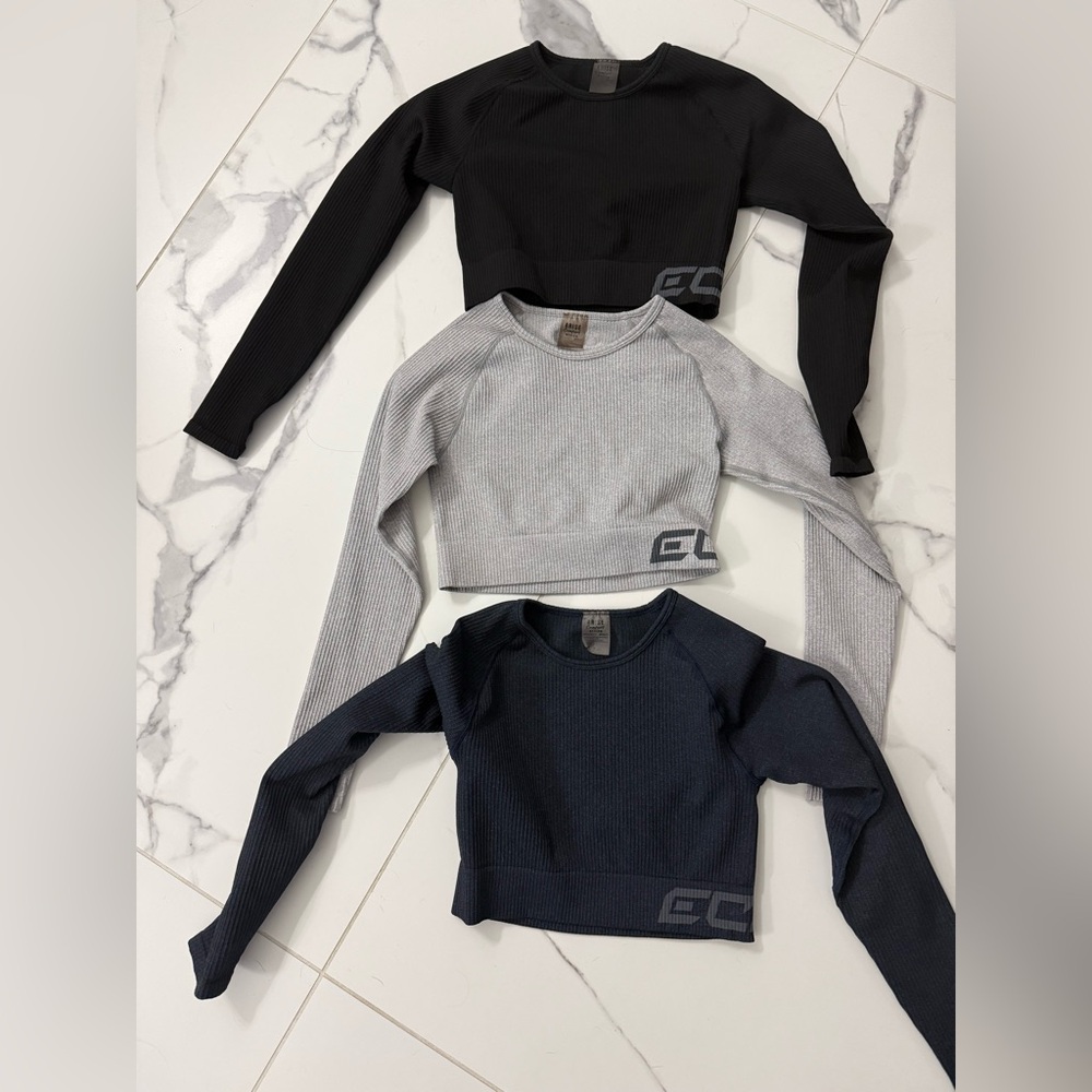 Three ECHT long sleeve crop tops